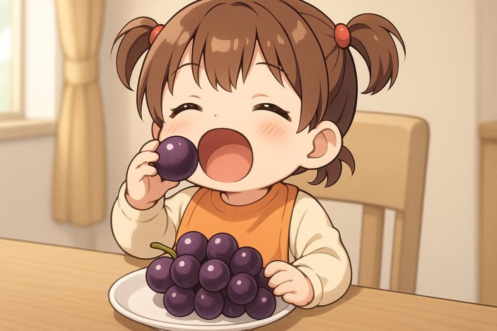 ブドウを丸呑みしようとする幼児